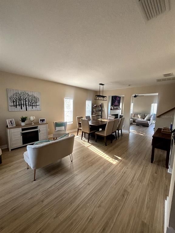 Dining room, Interior, Living room, Pendant Lights, Wood Texture Flooring