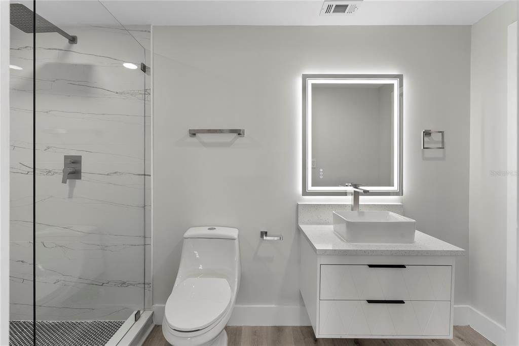 Bathroom, Glass Shower, Interior, Marble Walls, Wood Texture Flooring
