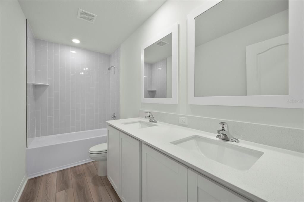 Bathroom, Dual Sink Vanities, Interior, Recessed Lighting, Wood Texture Flooring