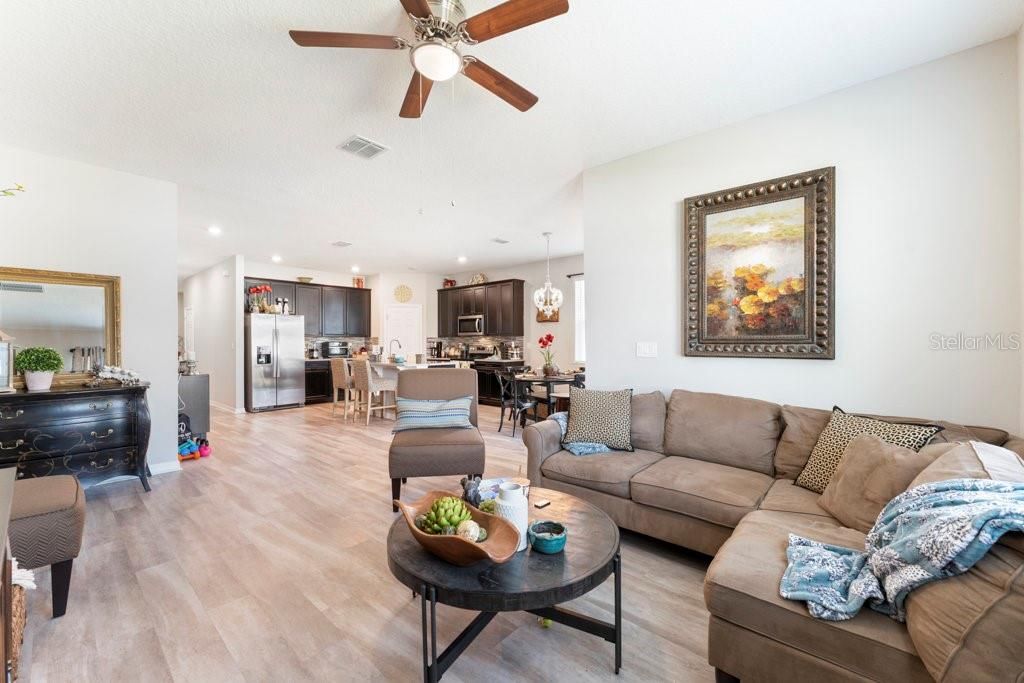Dining room, Interior, Kitchen, Living room, Pendant Lights, Recessed Lighting, Stainless Steel Appliances, Wood Texture Flooring