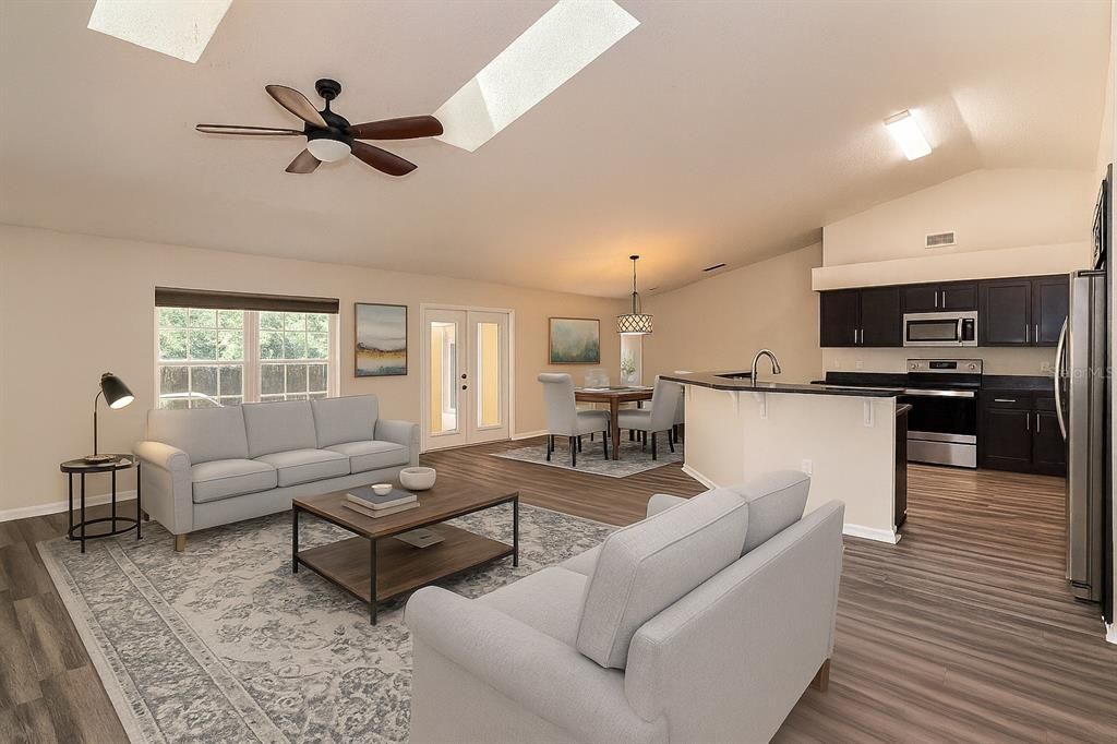 Chandelier, Dining room, Interior, Kitchen, Living room, Pendant Lights, Stainless Steel Appliances, Wood Texture Flooring