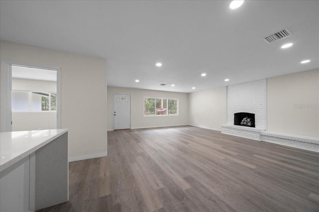 Empty room, Fireplace, Interior, Recessed Lighting, Wood Texture Flooring