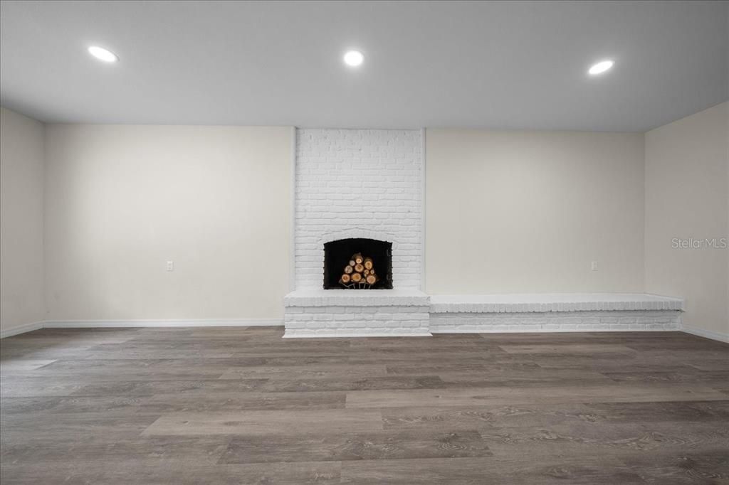 Empty room, Fireplace, Interior, Recessed Lighting, Wood Texture Flooring