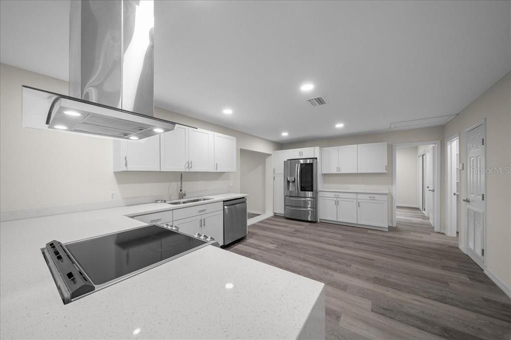 Interior, Kitchen, Recessed Lighting, Stainless Steel Appliances, Wood Texture Flooring