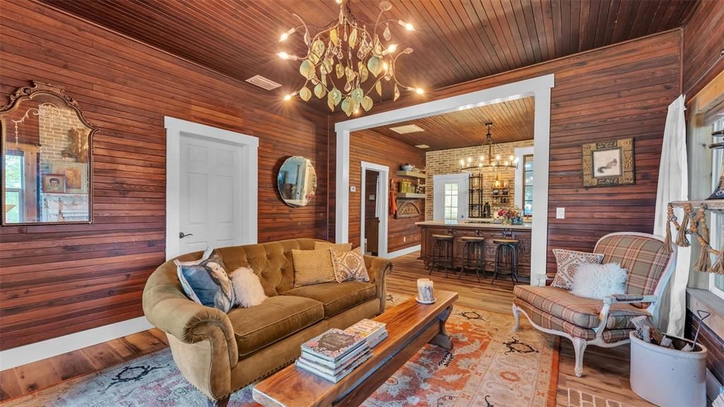 Chandelier, Interior, Living room, Recessed Lighting, Wooden Ceilings, Wood Texture Flooring, Wooden Walls