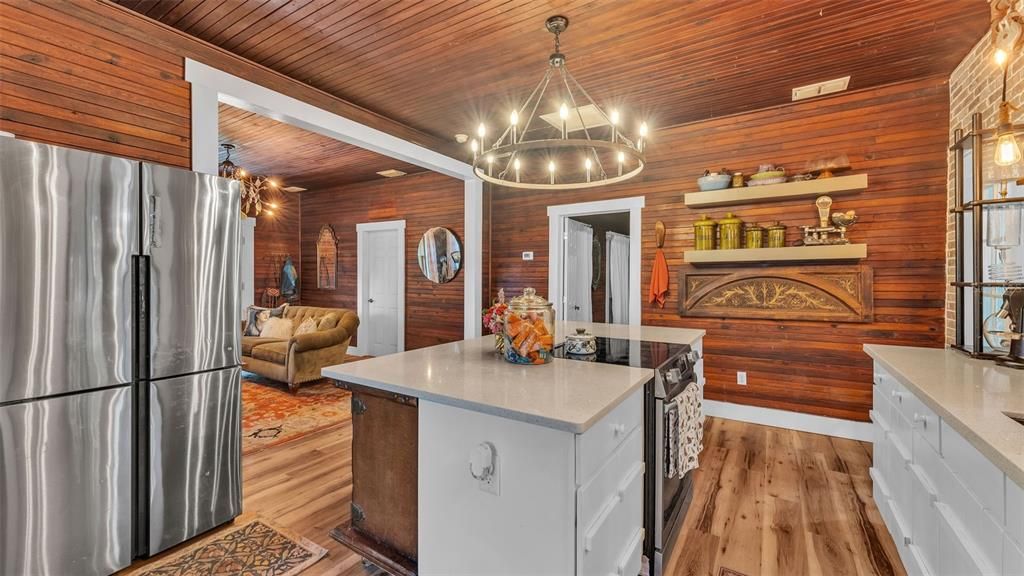 Chandelier, Interior, Kitchen, Living room, Stainless Steel Appliances, Wooden Ceilings, Wood Texture Flooring, Wooden Walls