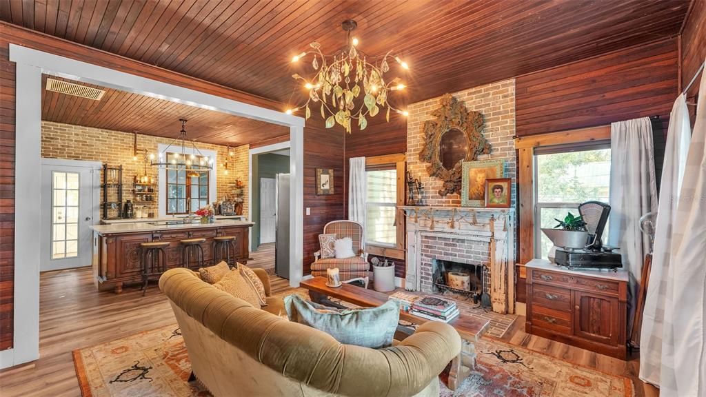 Chandelier, Fireplace, Interior, Living room, Stone Walls, Wooden Ceilings, Wood Texture Flooring, Wooden Walls