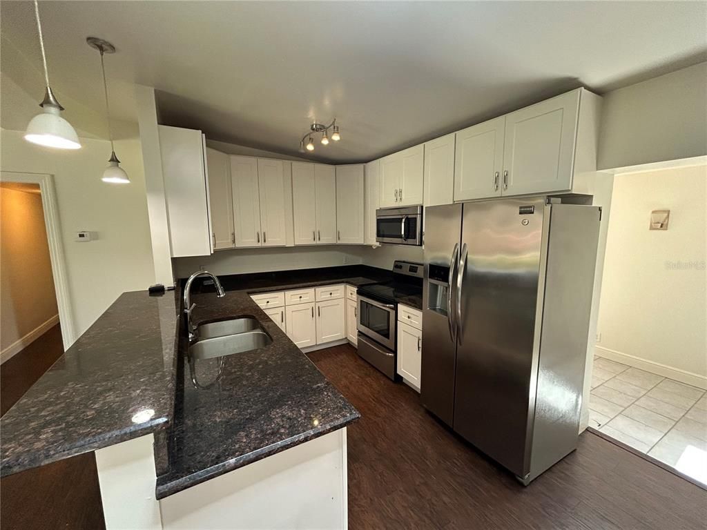 Interior, Kitchen, Pendant Lights, Stainless Steel Appliances, Wood Texture Flooring