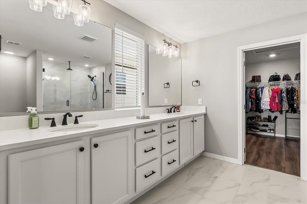 Bathroom, Dual Sink Vanities, Interior, Marble, Recessed Lighting, Walk-in Closets, Wood Texture Flooring