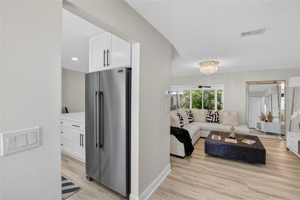 Chandelier, Interior, Kitchen, Living room, Recessed Lighting, Wood Texture Flooring