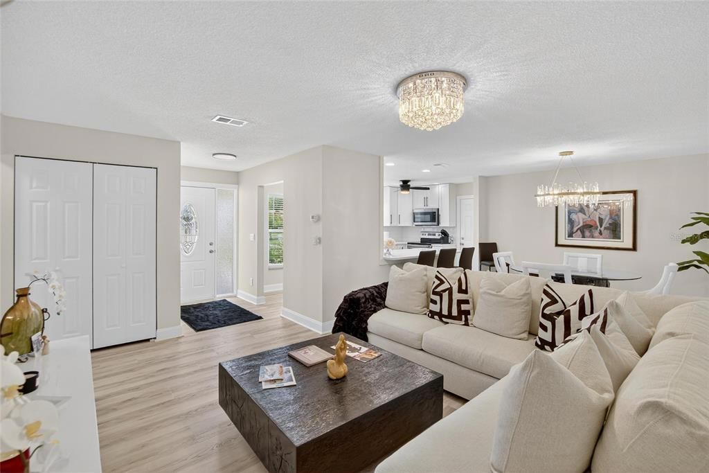 Chandelier, Dining room, Interior, Kitchen, Living room, Recessed Lighting, Wood Texture Flooring