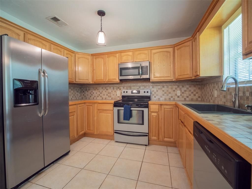Interior, Kitchen, Pendant Lights, Stainless Steel Appliances, Tile Countertops