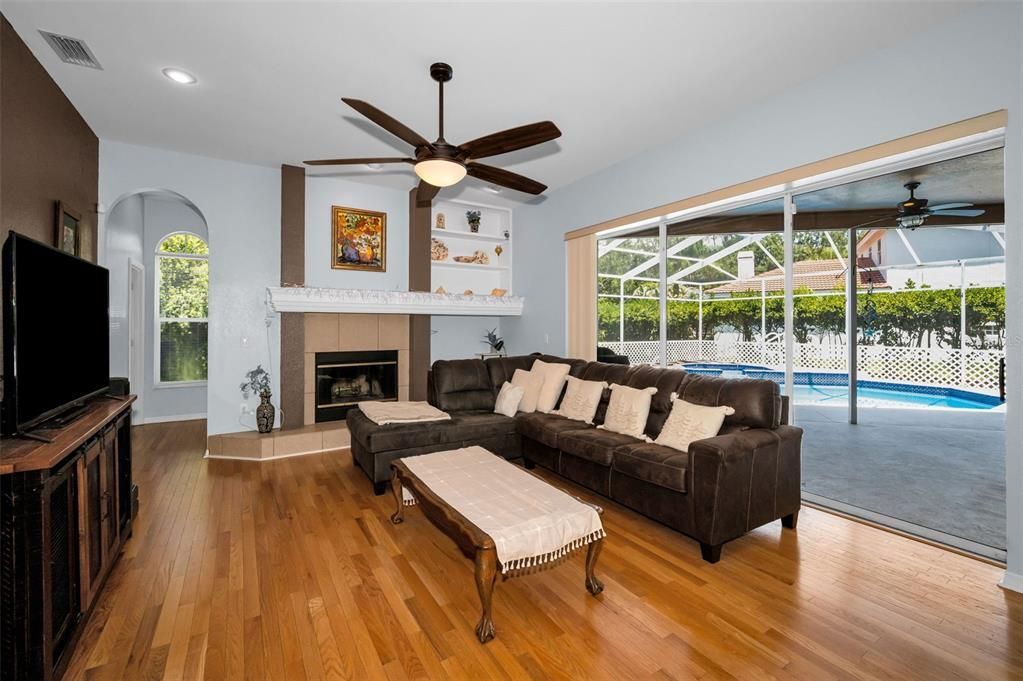 Fireplace, Interior, Living room, Recessed Lighting, Wood Texture Flooring