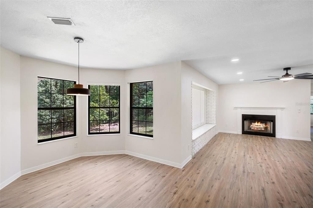Empty room, Fireplace, Interior, Pendant Lights, Recessed Lighting, Wood Texture Flooring