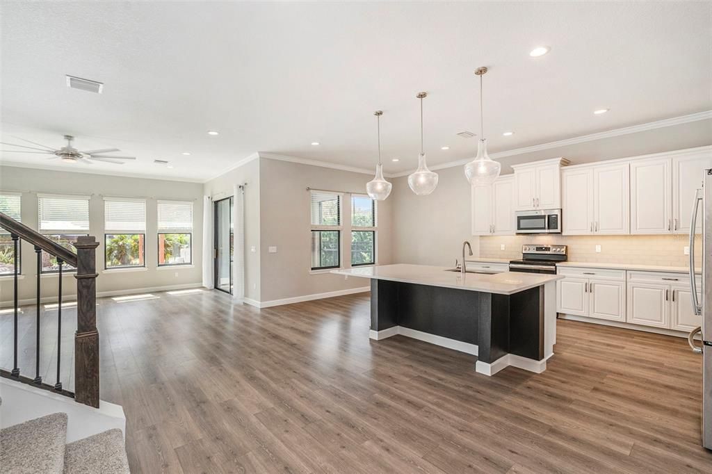 Interior, Kitchen, Pendant Lights, Recessed Lighting, Stainless Steel Appliances, Wood Texture Flooring