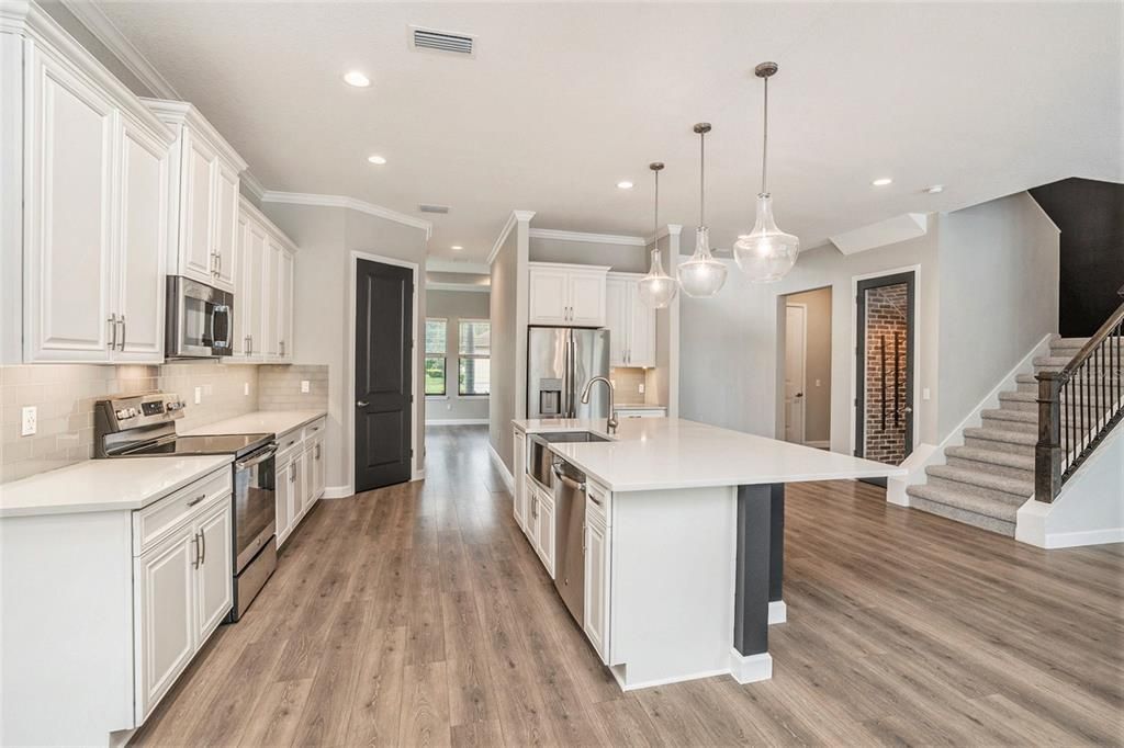 Interior, Kitchen, Pendant Lights, Recessed Lighting, Stainless Steel Appliances, Wood Texture Flooring