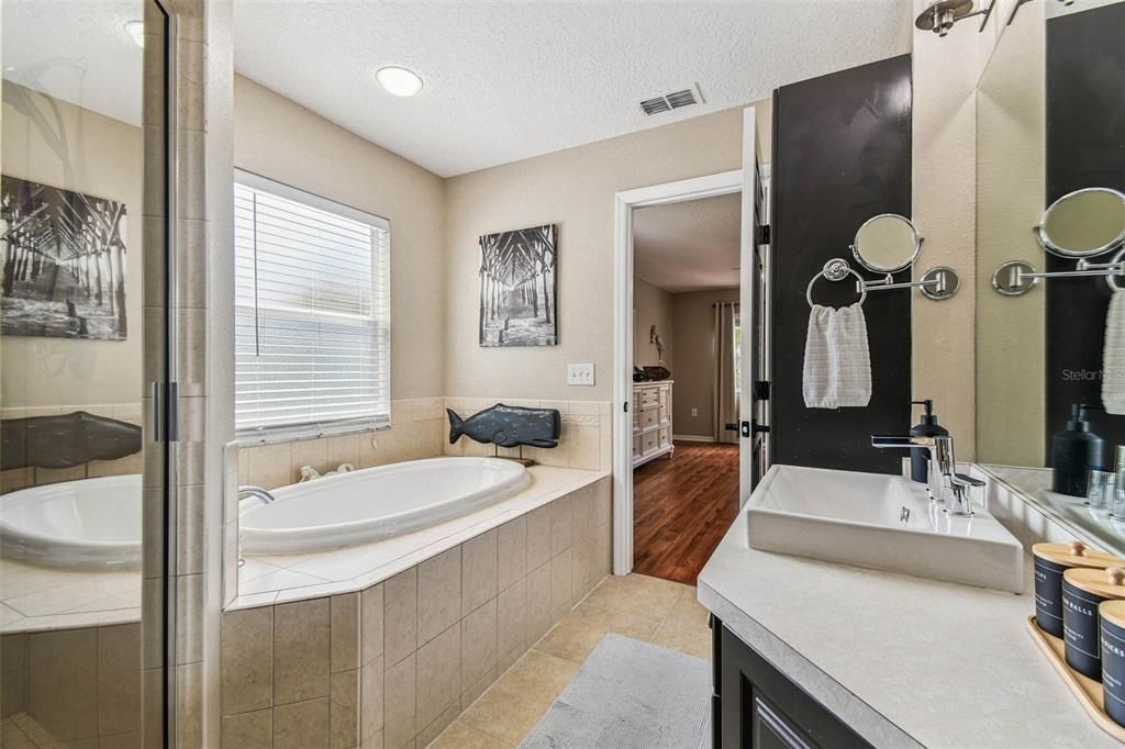 Bathroom, Dual Sink Vanities, Interior, Recessed Lighting, Wood Texture Flooring