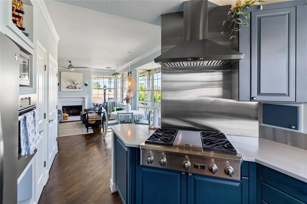 Fireplace, Interior, Kitchen, Living room, Stainless Steel Appliances, Wood Texture Flooring