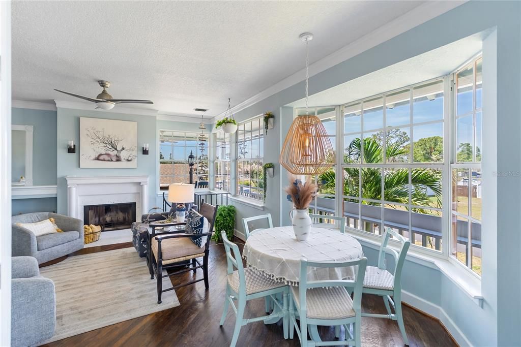 Dining room, Fireplace, Interior, Pendant Lights, Wood Texture Flooring