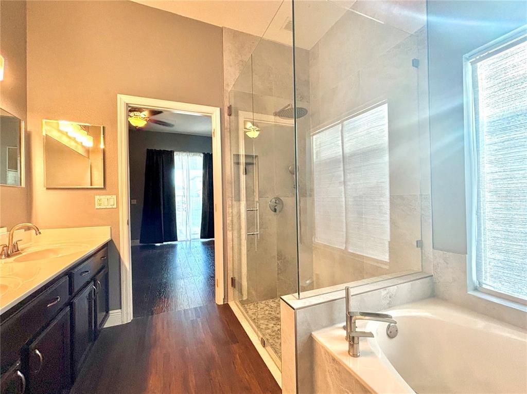 Bathroom, Dual Sink Vanities, Glass Shower, Interior, Wood Texture Flooring
