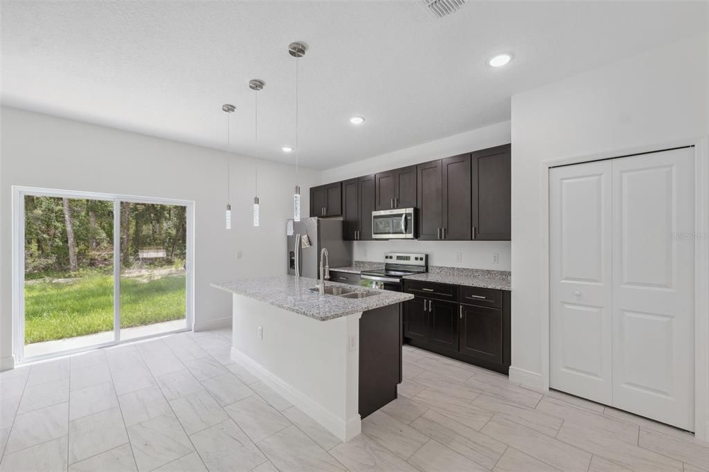 Interior, Kitchen, Marble, Pendant Lights, Recessed Lighting, Stainless Steel Appliances