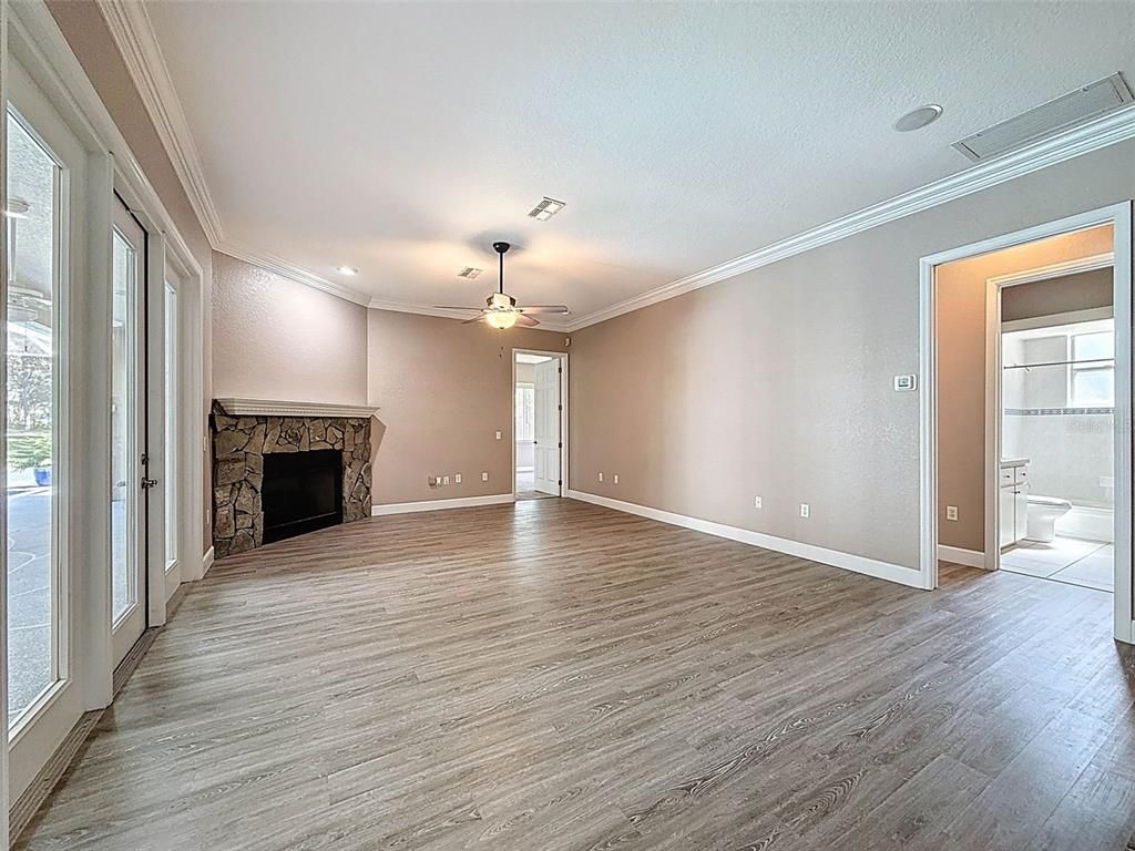 Empty room, Fireplace, Interior, Recessed Lighting, Wood Texture Flooring