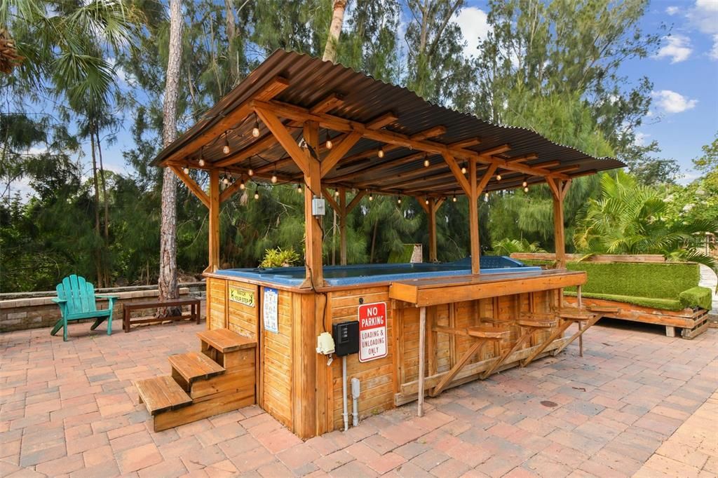 Exterior, Hot Tub, Outdoor Kitchen