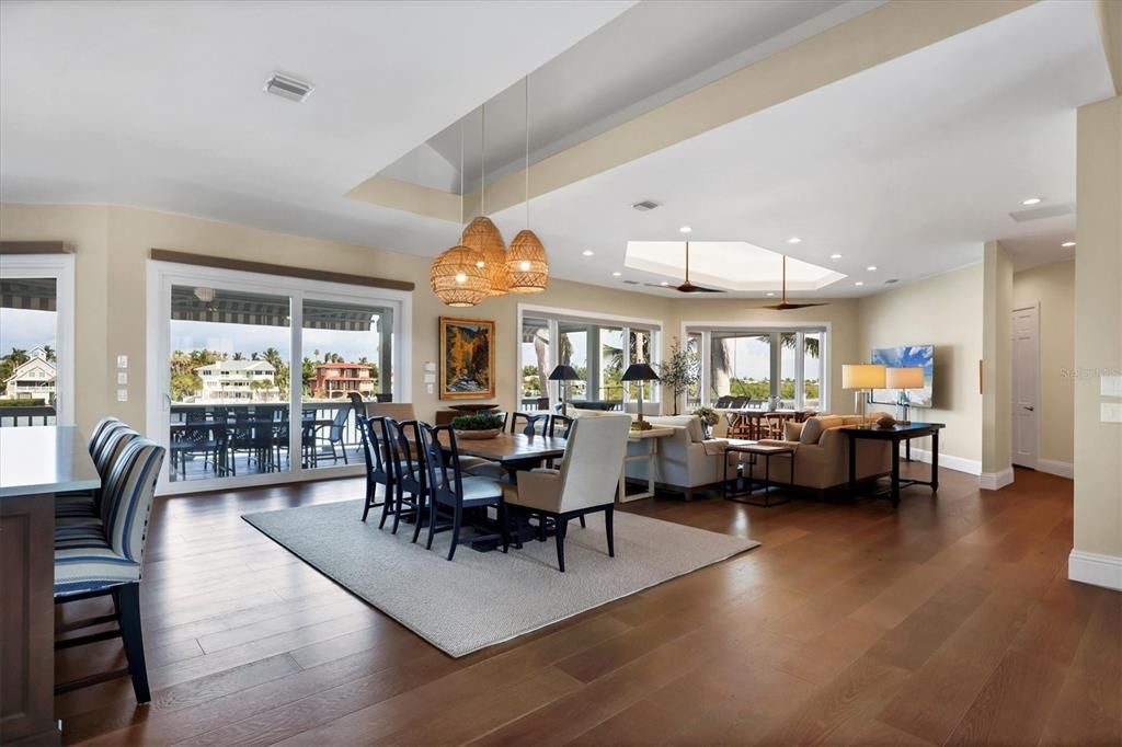 Chandelier, Dining room, Interior, Living room, Pendant Lights, Recessed Lighting, Wood Texture Flooring