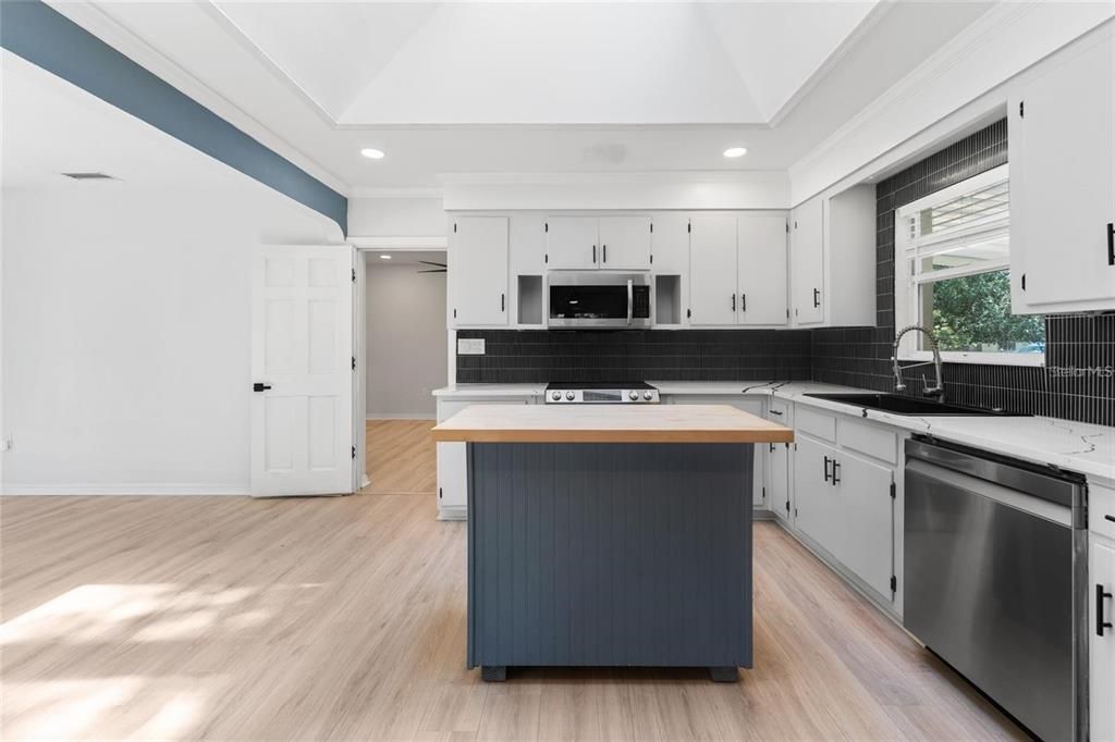 Interior, Kitchen, Recessed Lighting, Stainless Steel Appliances, Wood Texture Flooring