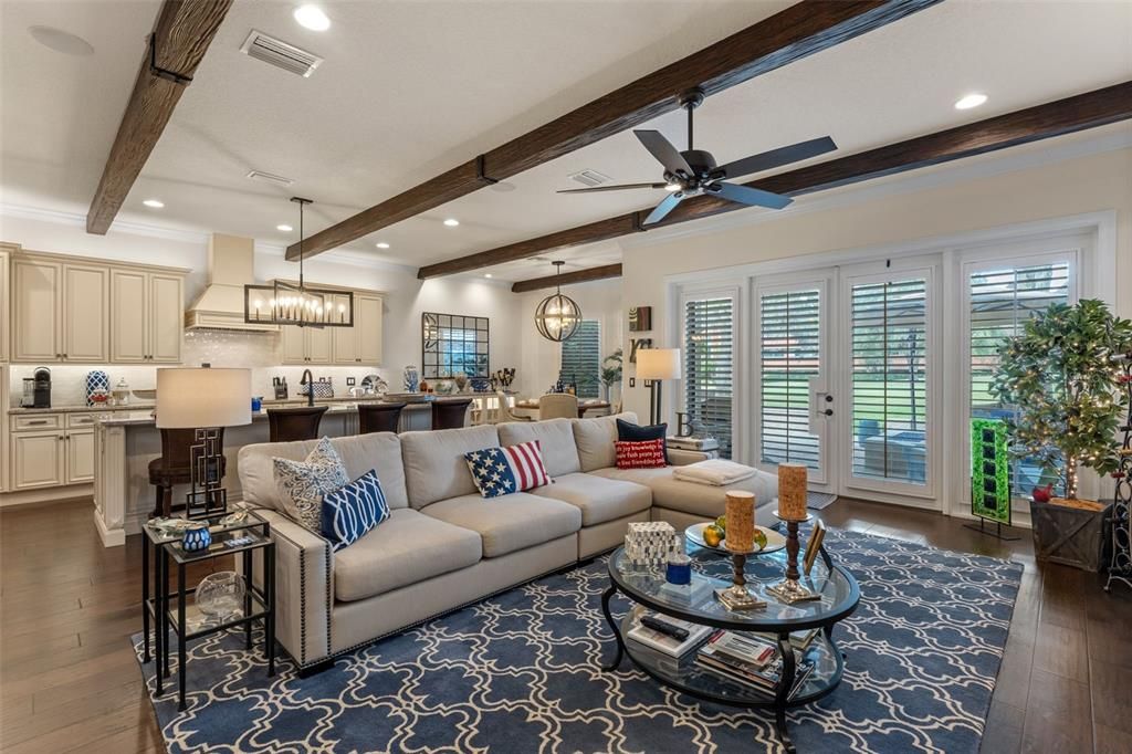 Dining room, Interior, Kitchen, Living room, Pendant Lights, Recessed Lighting, Stainless Steel Appliances, Wooden Beams, Wood Texture Flooring