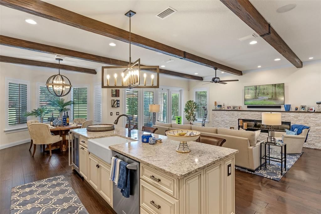 Chandelier, Dining room, Interior, Kitchen, Living room, Pendant Lights, Recessed Lighting, Wooden Beams, Wood Texture Flooring