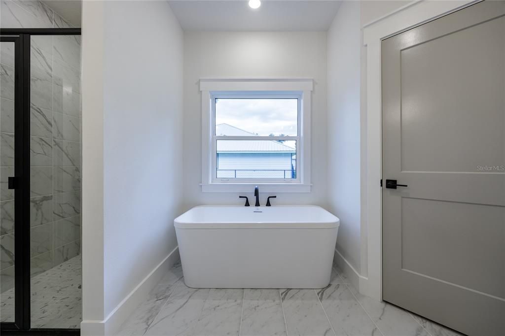 Bathroom, Free Standing Baths, Interior, Marble, Marble Walls, Recessed Lighting