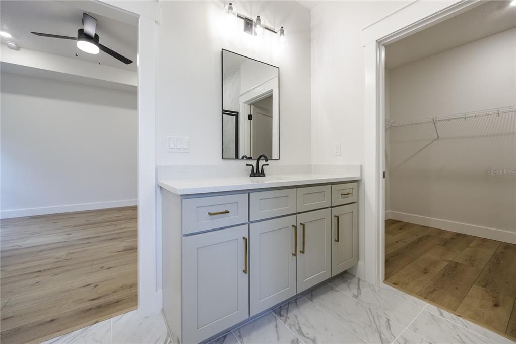 Bathroom, Dual Sink Vanities, Interior, Marble, Walk-in Closets, Wood Texture Flooring