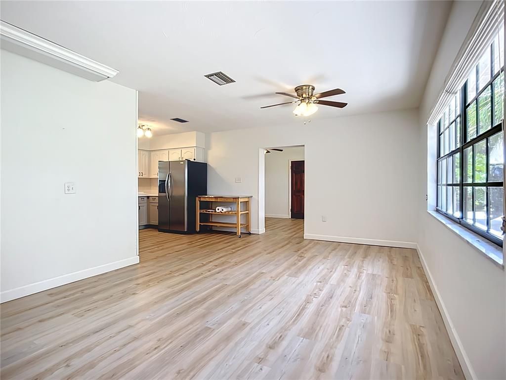 Empty room, Interior, Kitchen, Stainless Steel Appliances, Wood Texture Flooring