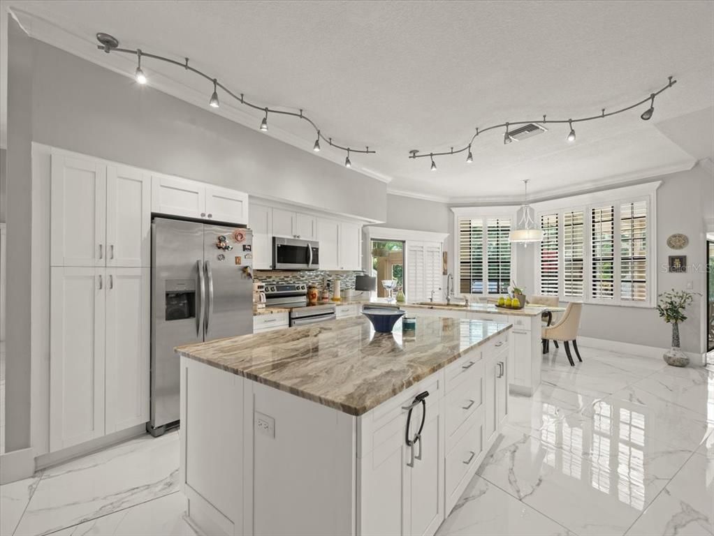 Dining room, Interior, Kitchen, Marble, Pendant Lights, Stainless Steel Appliances