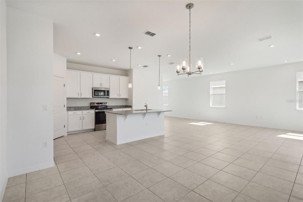 Empty room, Interior, Kitchen, Pendant Lights, Recessed Lighting, Stainless Steel Appliances
