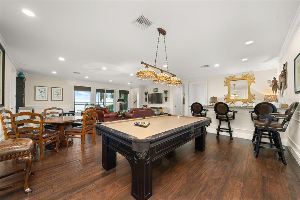 Billiard Table, Chandelier, Dining room, Game Room, Interior, Recessed Lighting, Wood Texture Flooring