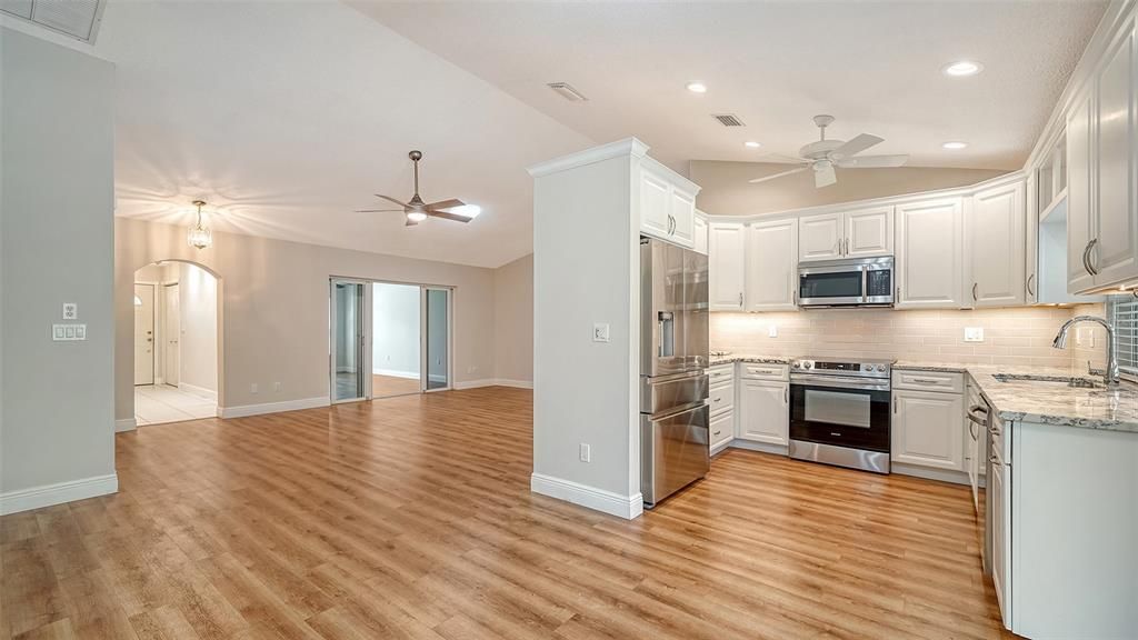 Interior, Kitchen, Recessed Lighting, Stainless Steel Appliances, Wood Texture Flooring