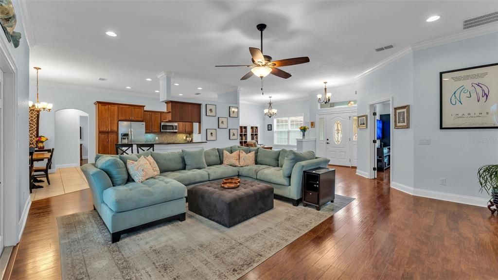 Chandelier, Dining room, Interior, Kitchen, Living room, Recessed Lighting, Stainless Steel Appliances, Wood Texture Flooring