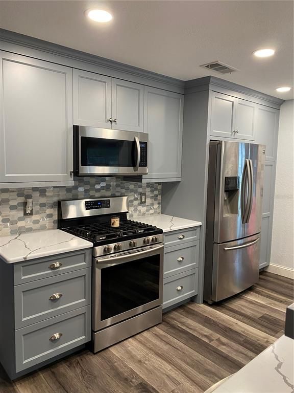 Interior, Kitchen, Recessed Lighting, Stainless Steel Appliances, Wood Texture Flooring