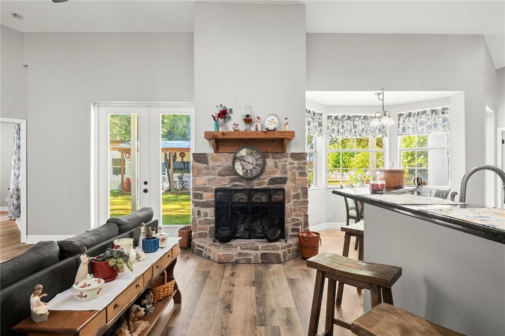 Dining room, Fireplace, Interior, Pendant Lights, Wood Texture Flooring