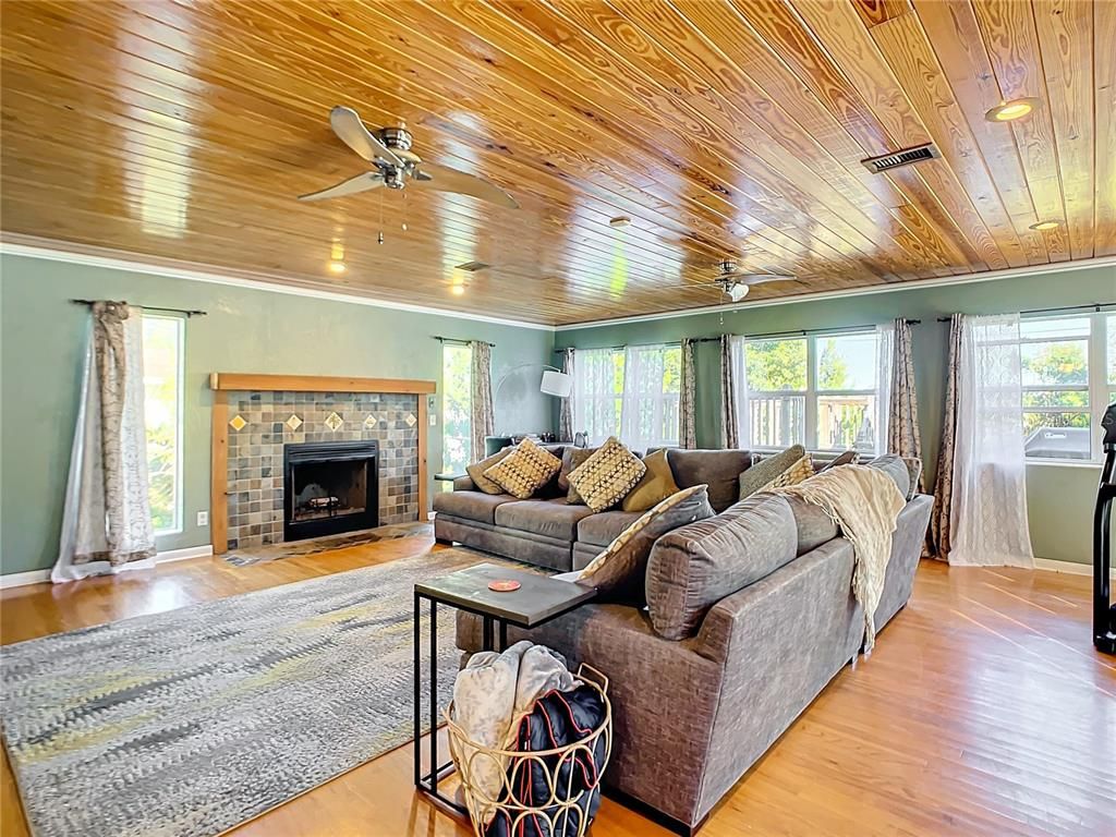 Fireplace, Interior, Living room, Recessed Lighting, Wooden Ceilings, Wood Texture Flooring