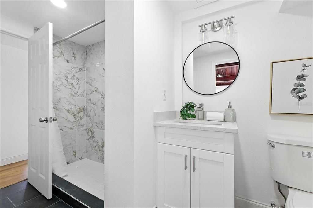 Bathroom, Interior, Marble Walls, Recessed Lighting, Wood Texture Flooring