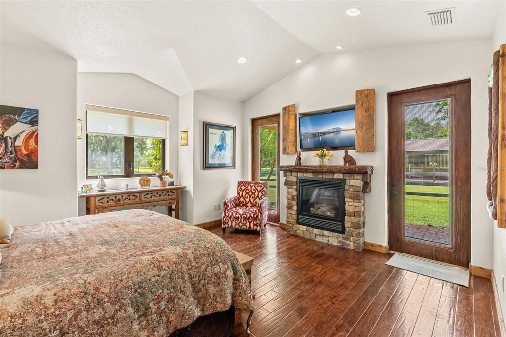 Bedroom, Fireplace, Interior, Recessed Lighting, Wood Texture Flooring
