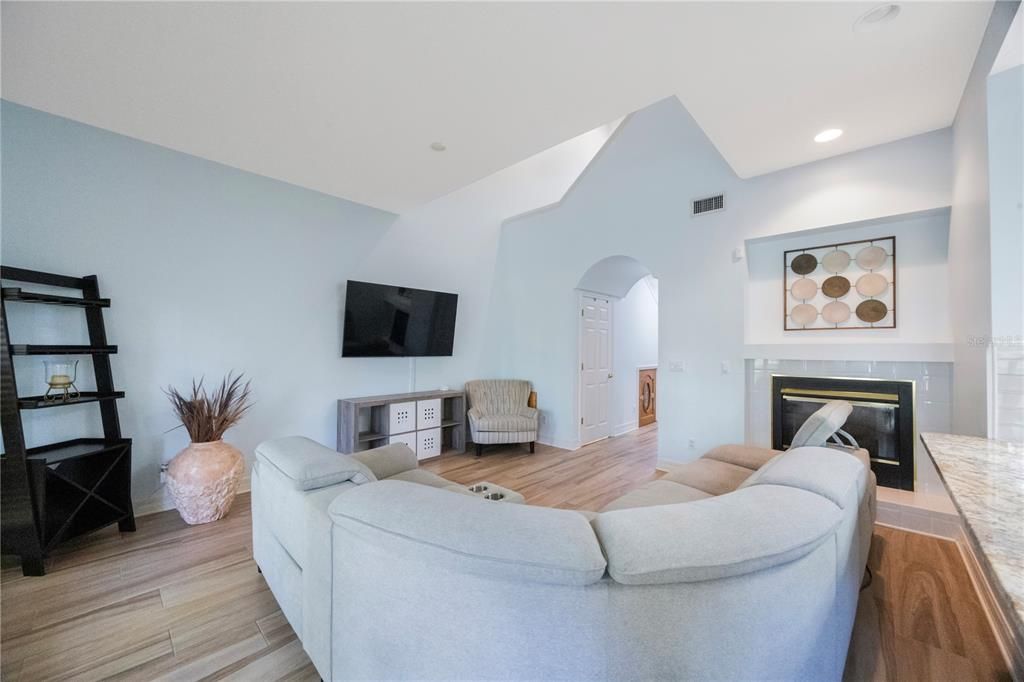 Fireplace, Interior, Living room, Recessed Lighting, Wood Texture Flooring