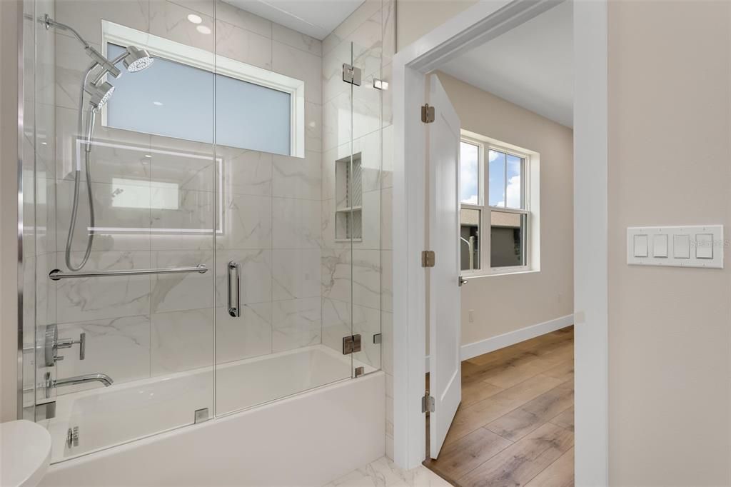 Bathroom, Glass Shower, Interior, Marble, Marble Walls, Recessed Lighting, Wood Texture Flooring