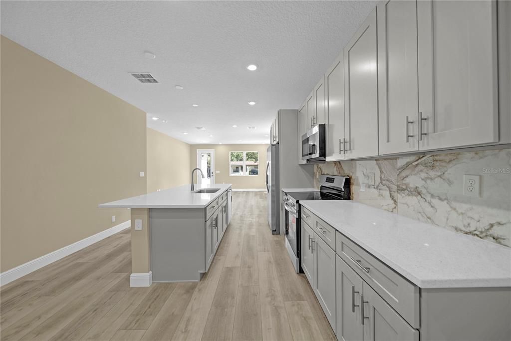 Interior, Kitchen, Marble Walls, Recessed Lighting, Wood Texture Flooring