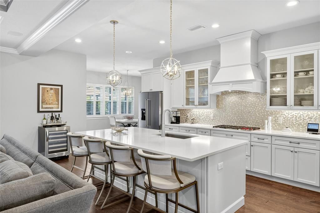Chandelier, Interior, Kitchen, Pendant Lights, Recessed Lighting, Stainless Steel Appliances, Wood Texture Flooring