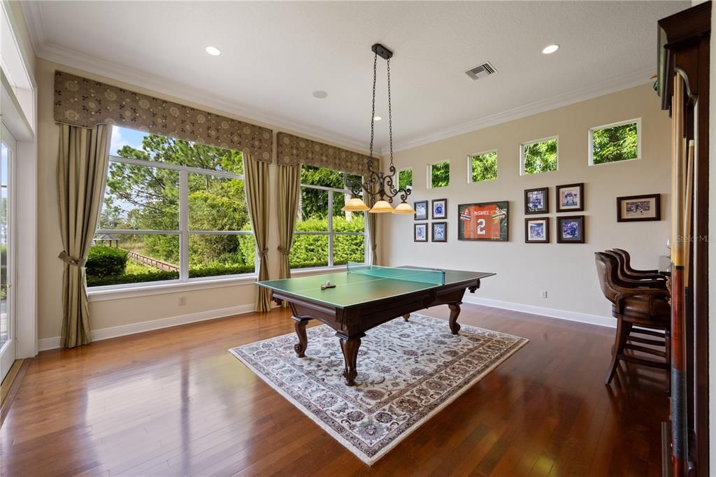 Billiard Table, Chandelier, Game Room, Interior, Pendant Lights, Recessed Lighting, Wood Texture Flooring