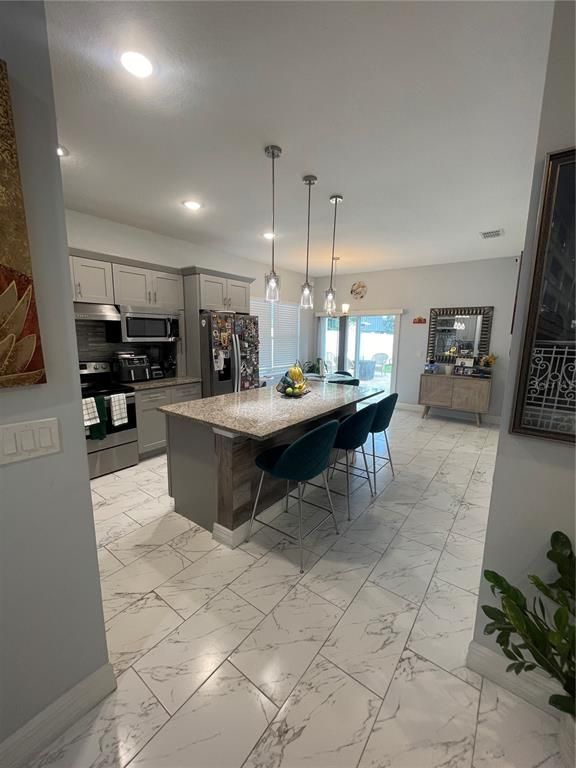 Dining room, Interior, Kitchen, Marble, Pendant Lights, Recessed Lighting, Stainless Steel Appliances